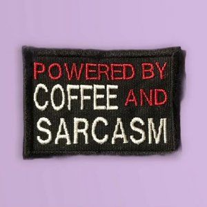 Emblem Powered by Coffee and Sarcasm
